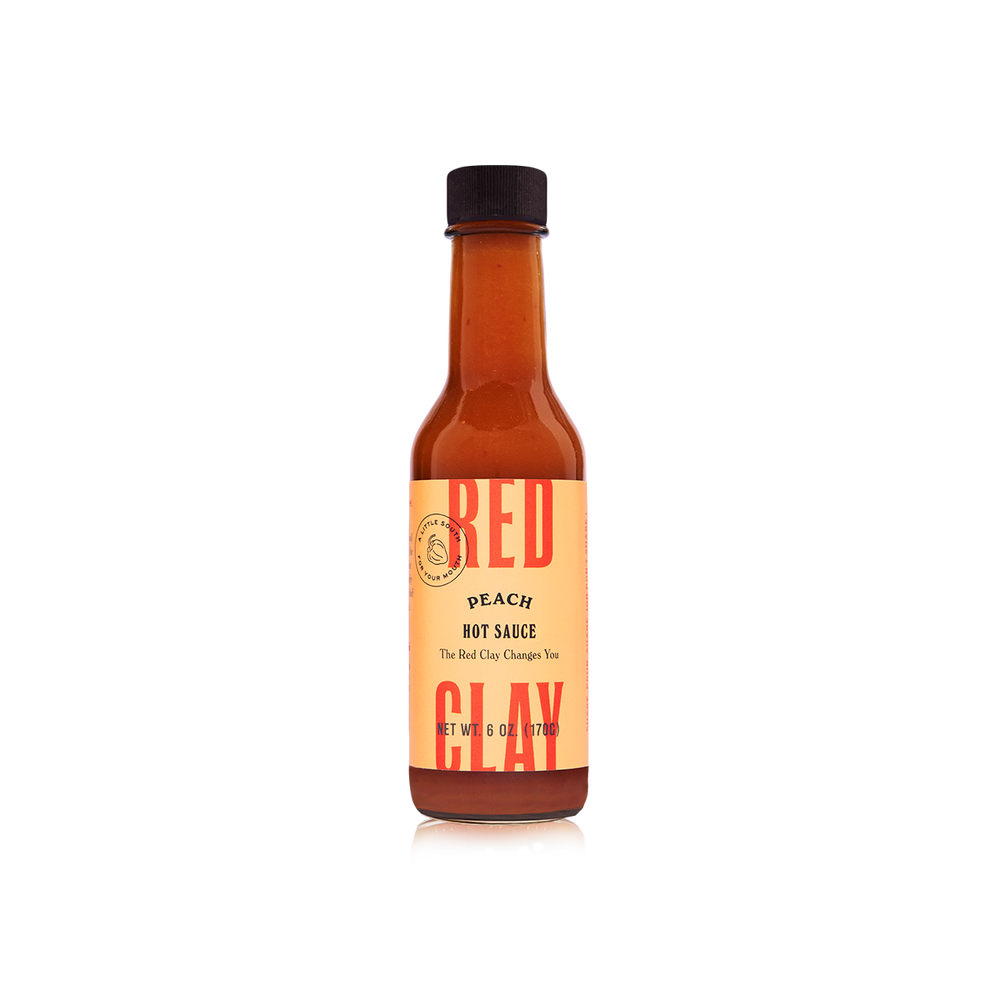 Sorghum + Peach Hot Sauce bottle
