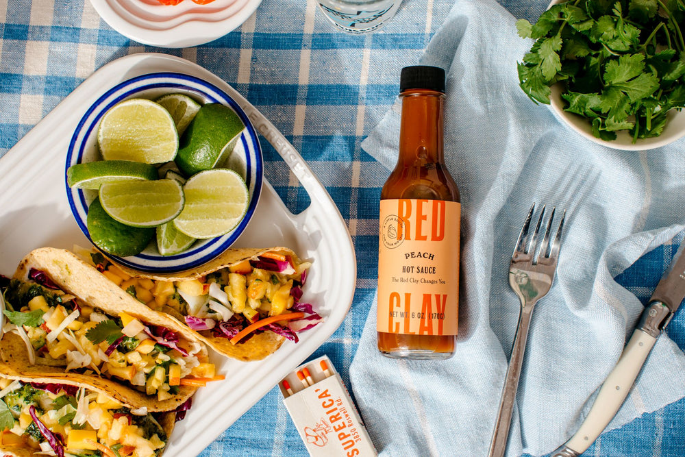 Sorghum + Peach Hot Sauce lifestyle shot